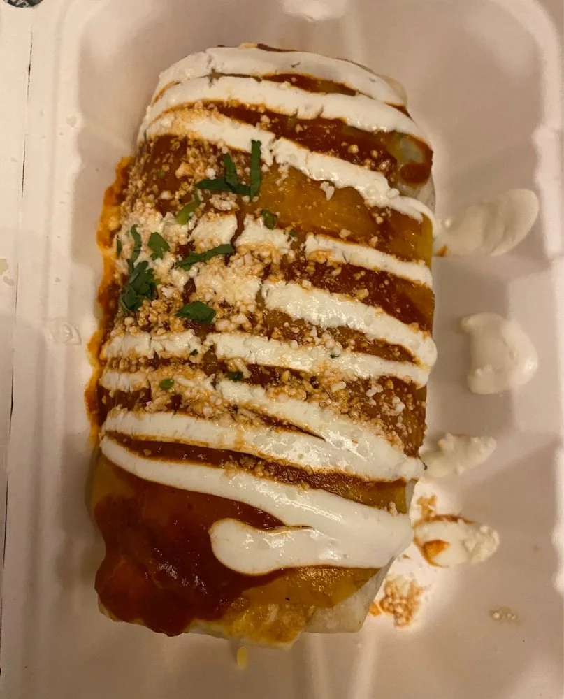 Enchiladas - Corn tortillas filled with seasoned meat, smothered in rich enchilada sauce and cheese.