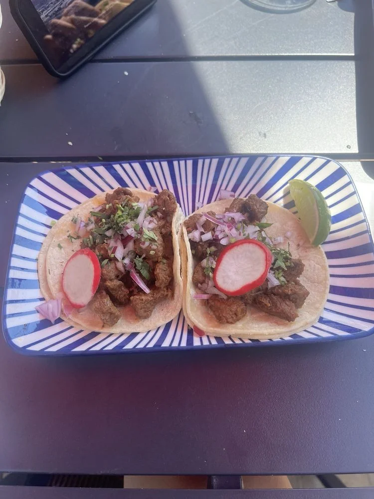 Steak Asada Quesadillas - Grilled flour tortillas stuffed with carne asada and melted cheese.