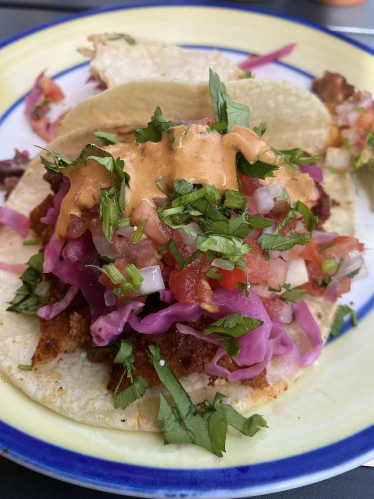 Tropical Shrimp Tacos - Shrimp tacos with tropical mango salsa, avocado, and fresh cilantro.