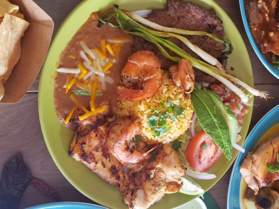 Tres Amigos Plate - A sampler plate featuring three of our most popular Mexican dishes.